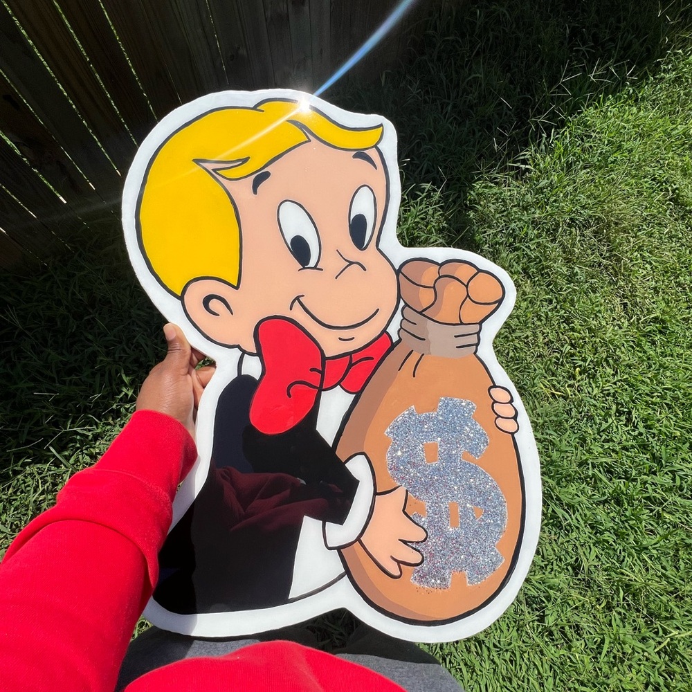 Richie Rich Cartoon Sign with Money Bag
